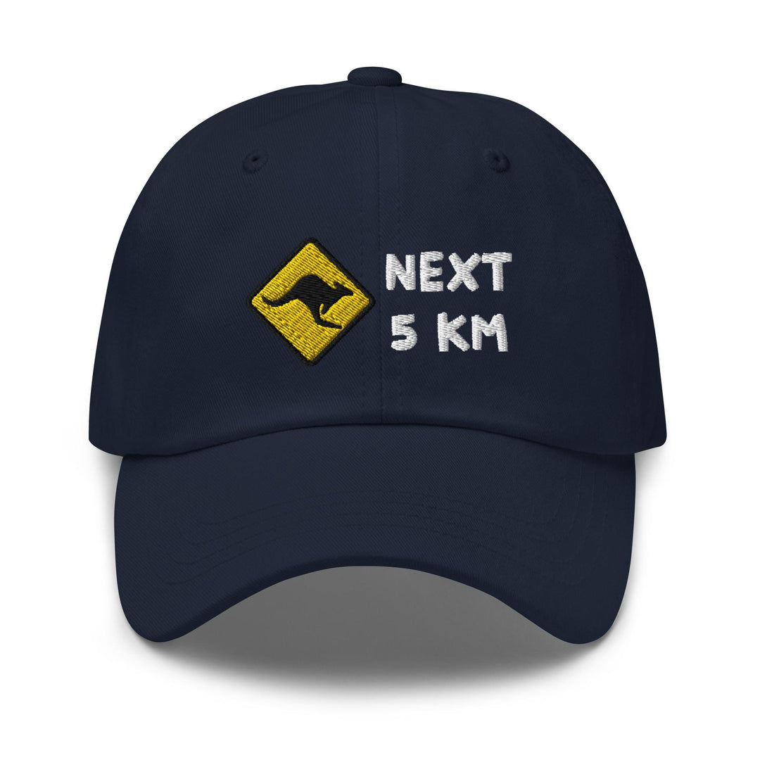 a baseball cap with a kangaroo on the front and next 5 km on the back