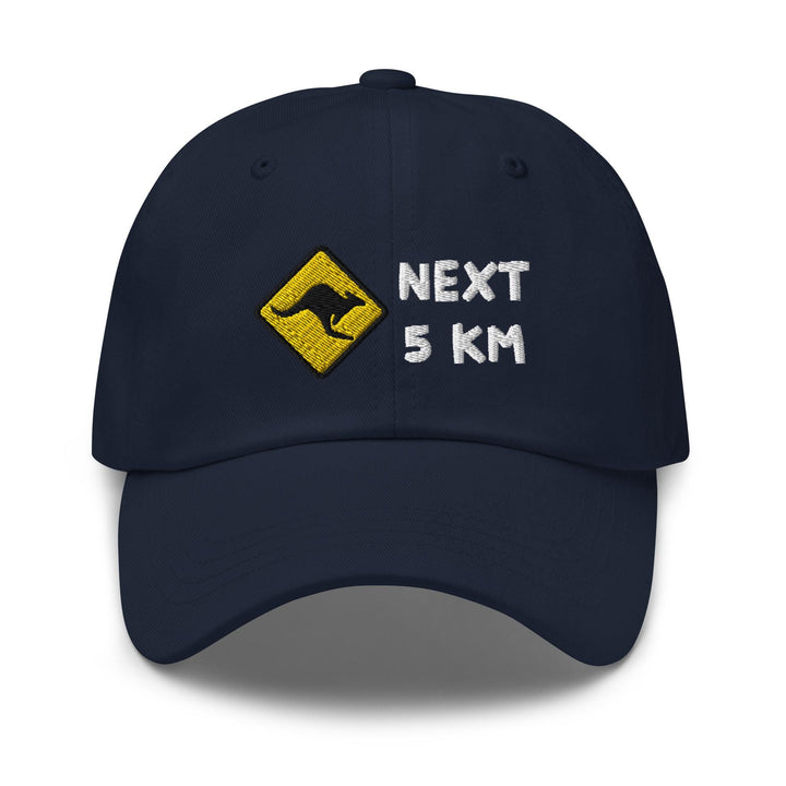 a baseball cap with a kangaroo on the front and next 5 km on the back