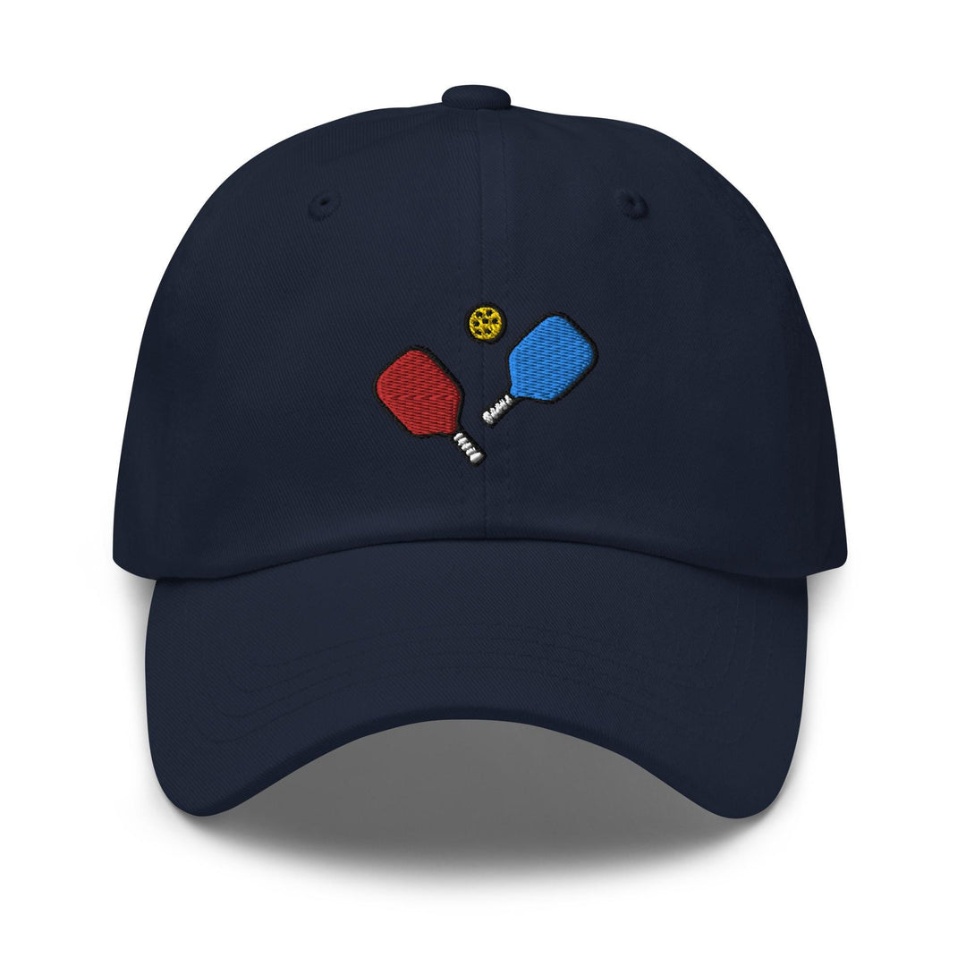 a blue hat with two ping pong paddles on it