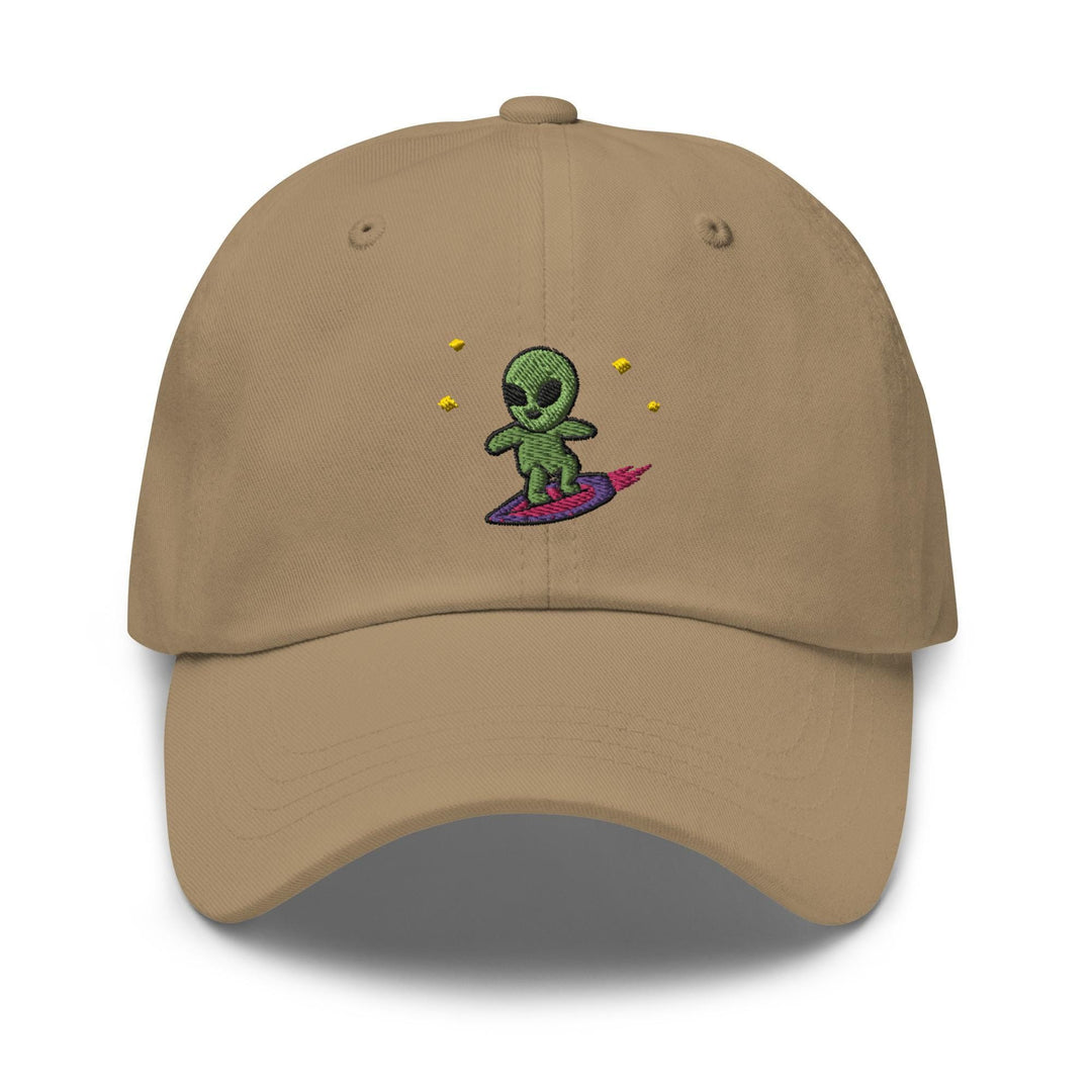 a tan hat with an alien on it
