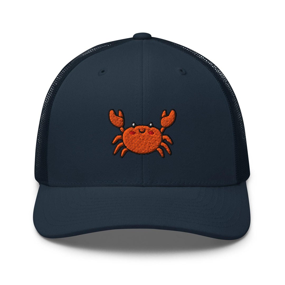 a blue trucker hat with an orange crab embroidered on the front