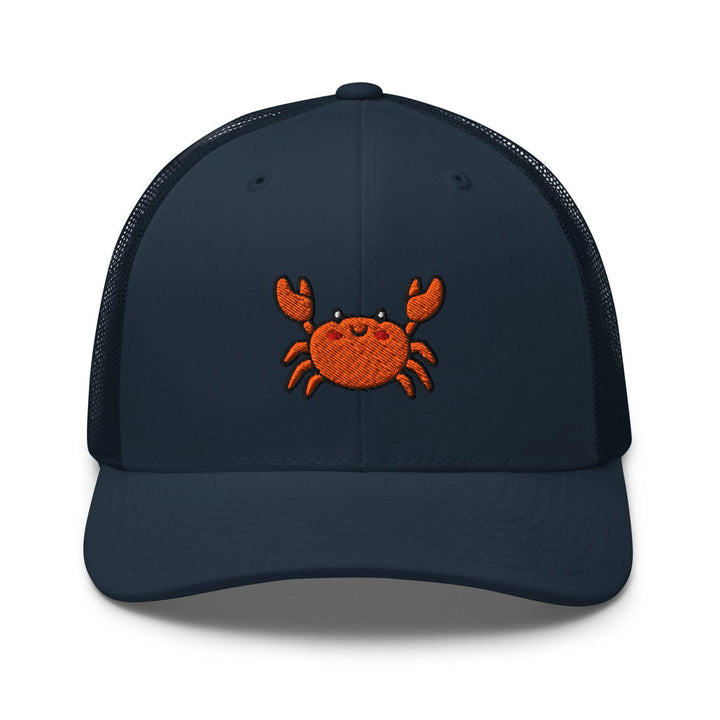 a blue trucker hat with an orange crab embroidered on the front