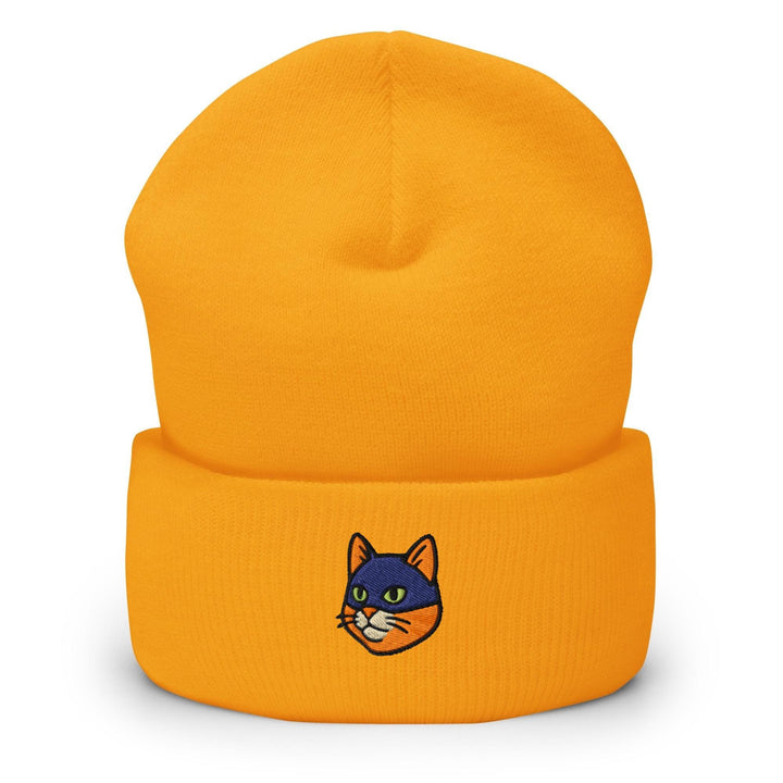 a yellow beanie with a black cat on it