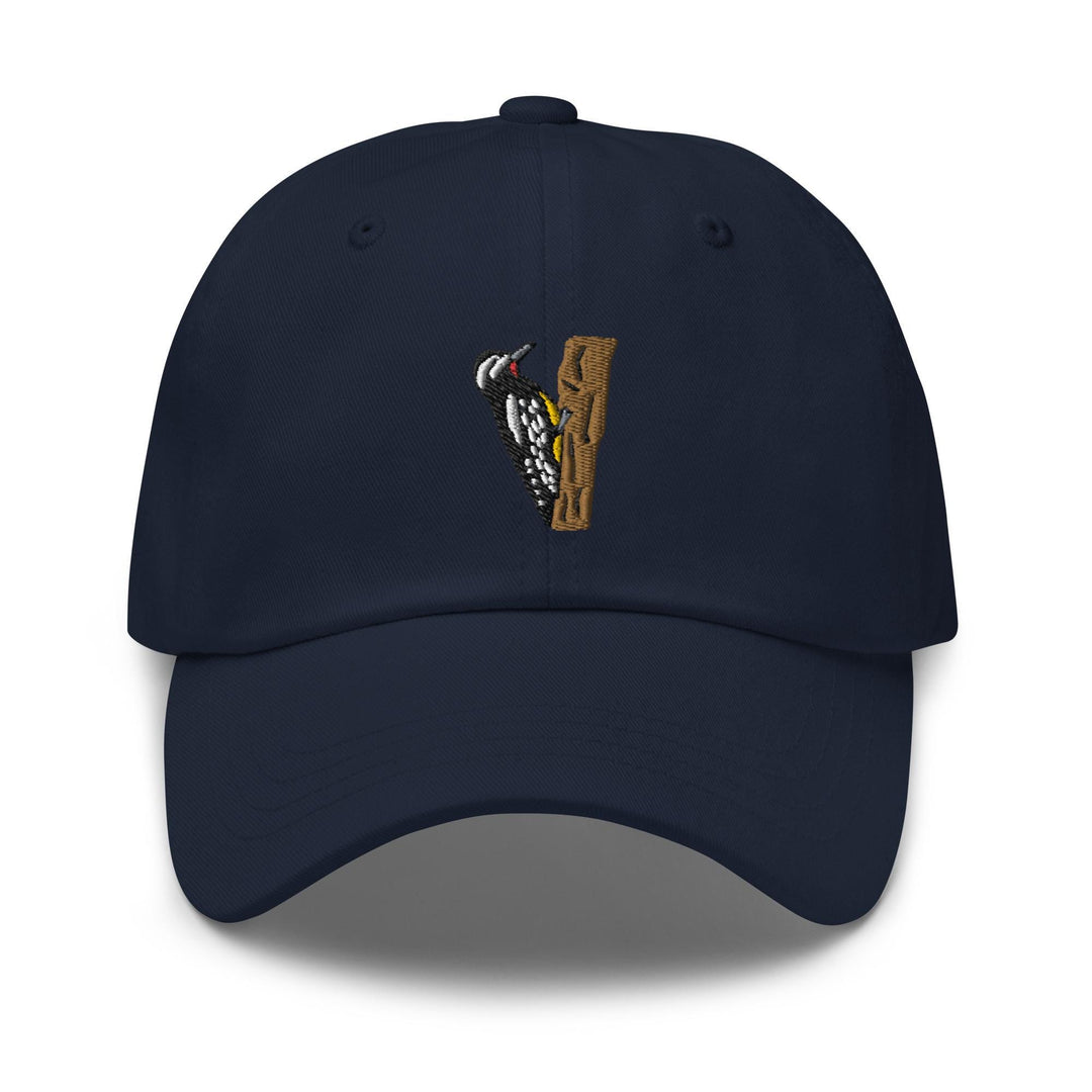 a baseball cap with a picture of a hand holding a baseball bat