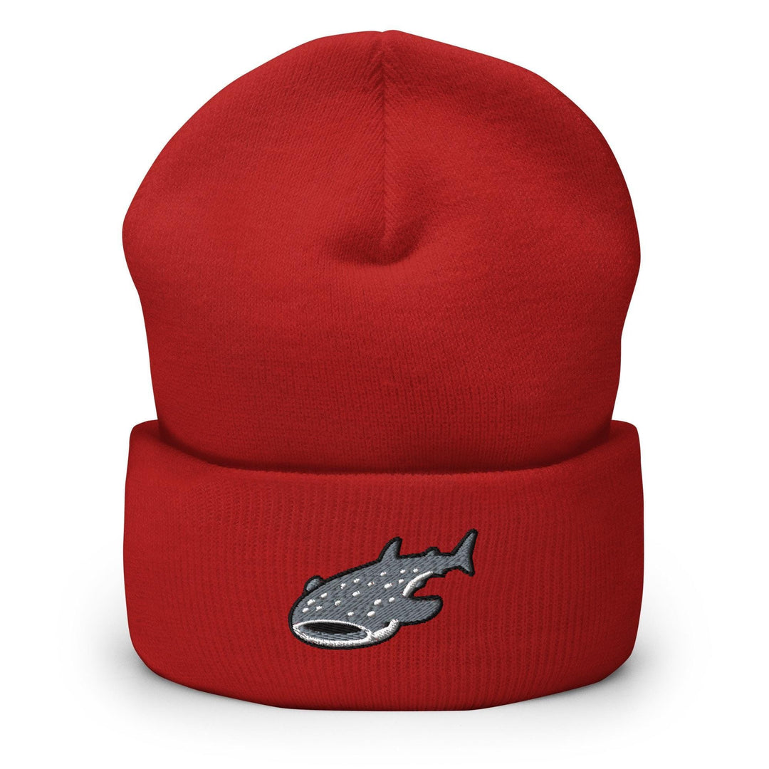 a red beanie with a fish embroidered on it