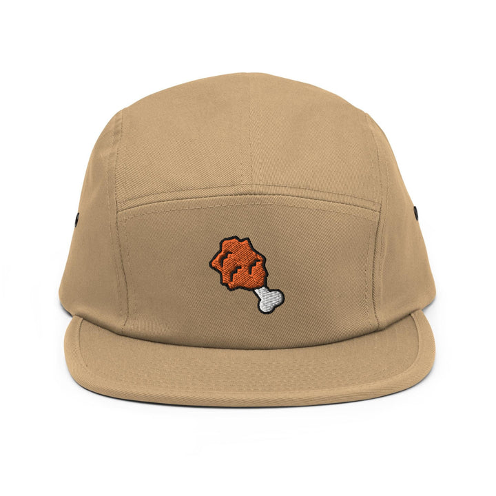 a brown hat with a picture of a dog on it
