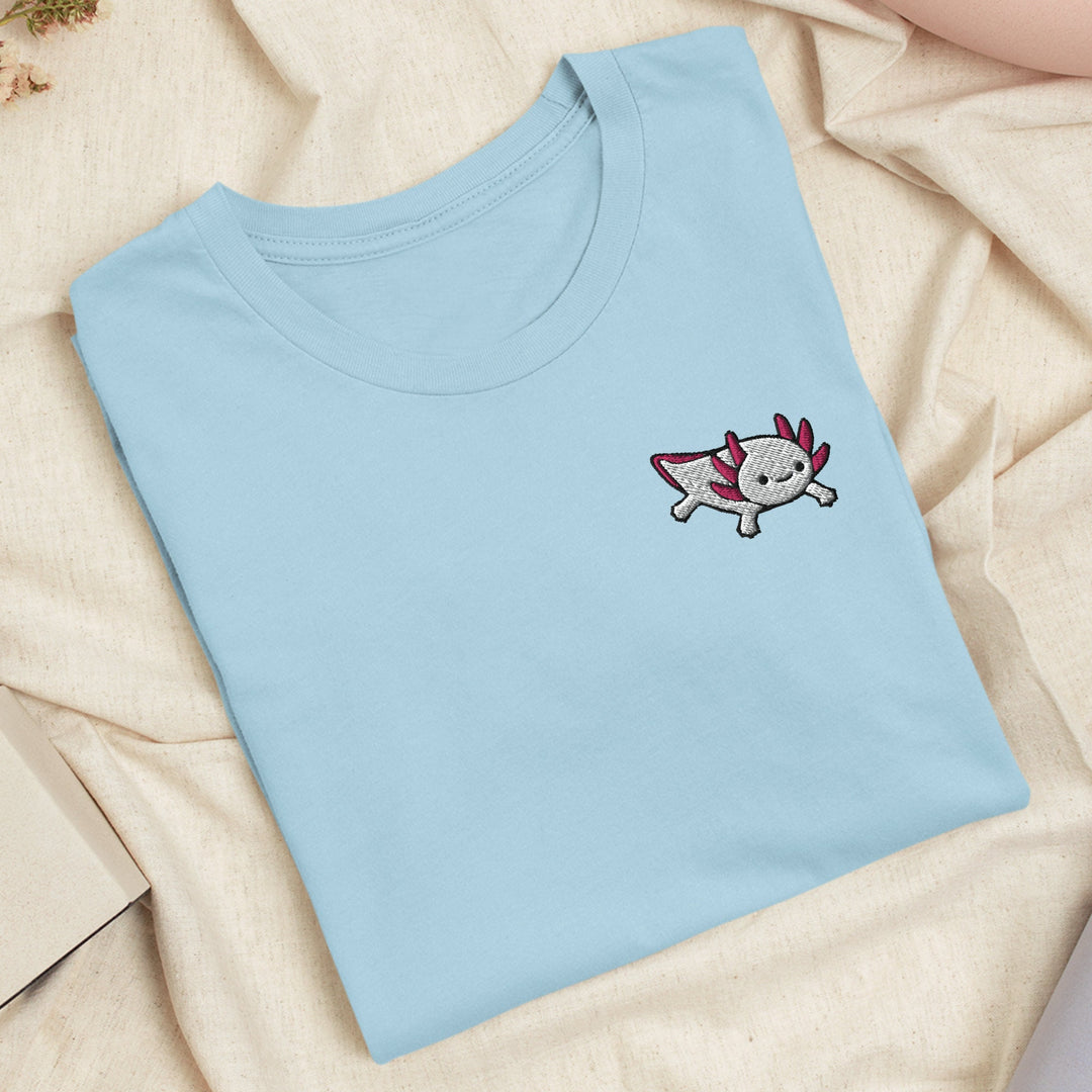 a blue t - shirt with a picture of a cat on it