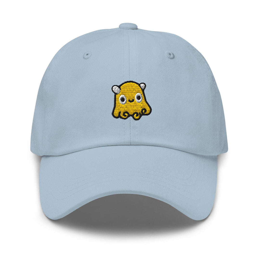 a light blue hat with a cartoon character on it