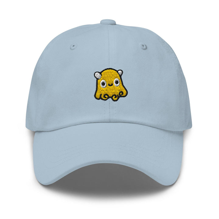 a light blue hat with a cartoon character on it