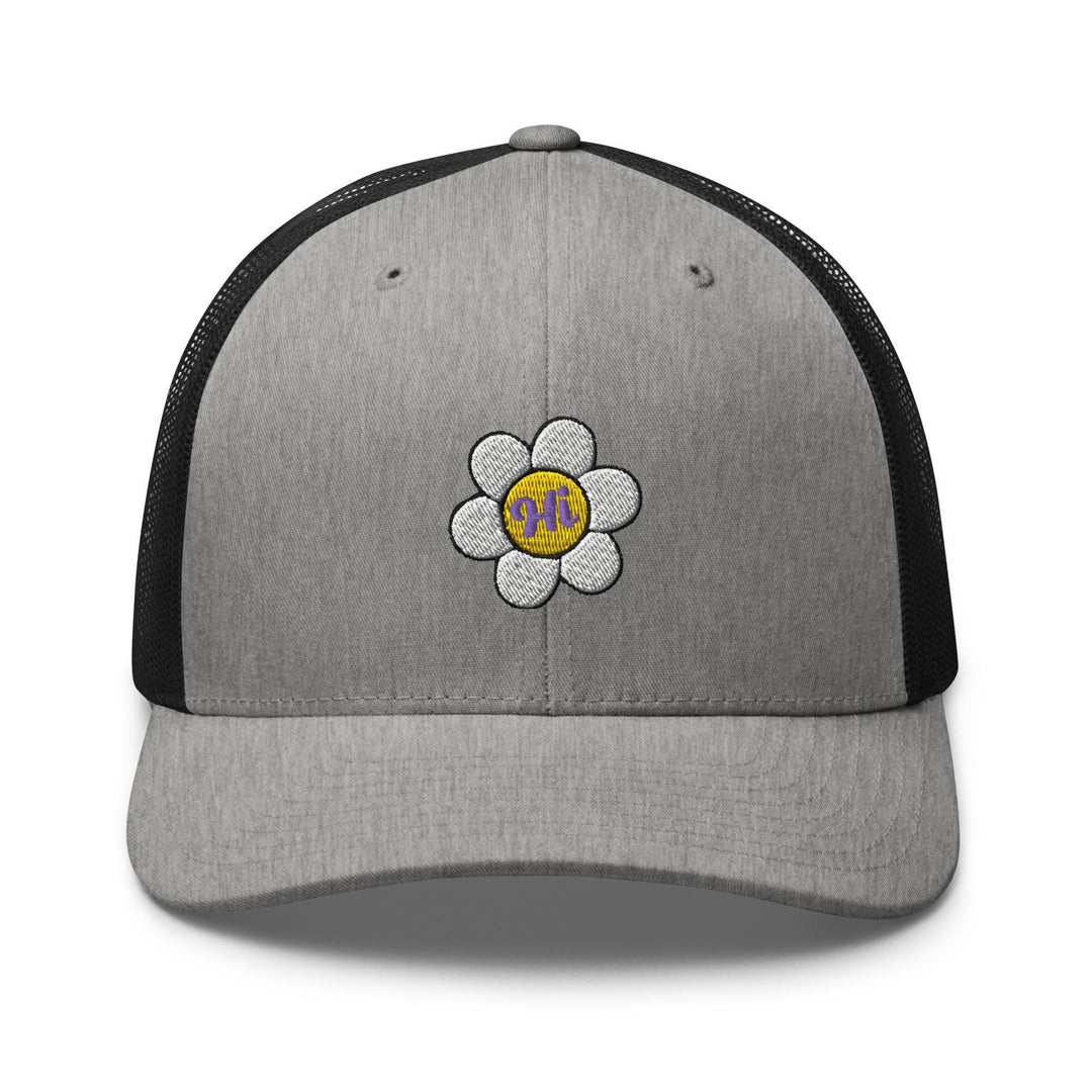 a gray and black hat with a flower on it