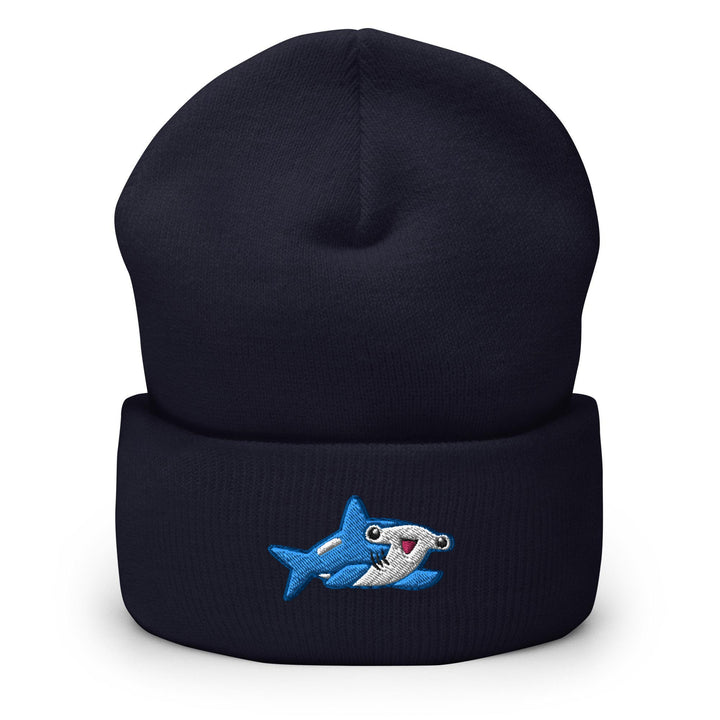 a blue hat with a shark on it