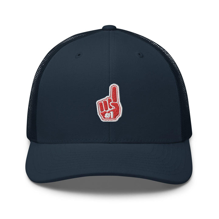 a blue trucker hat with a red peace sign on it