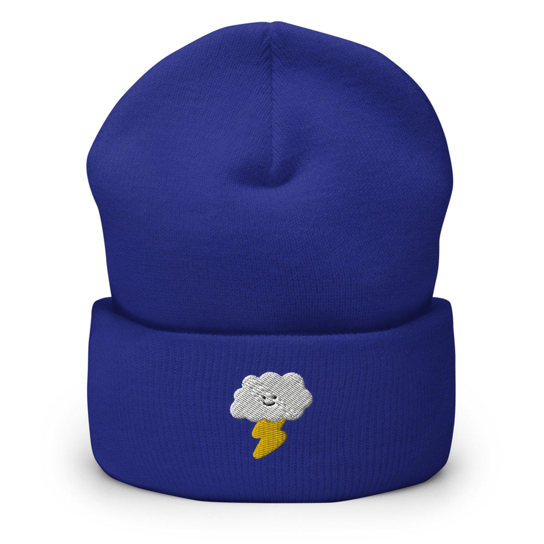 a blue beanie with a white cloud on it