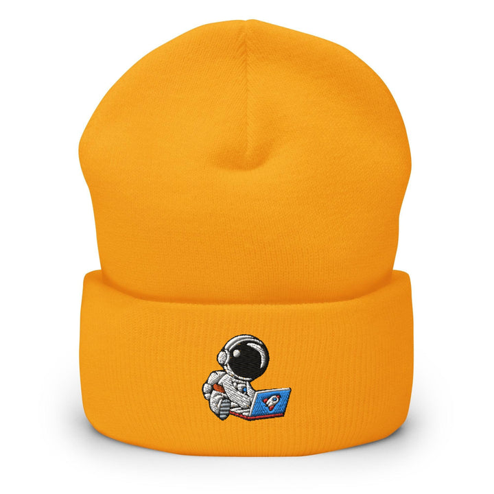 a yellow beanie with an astronaut on it