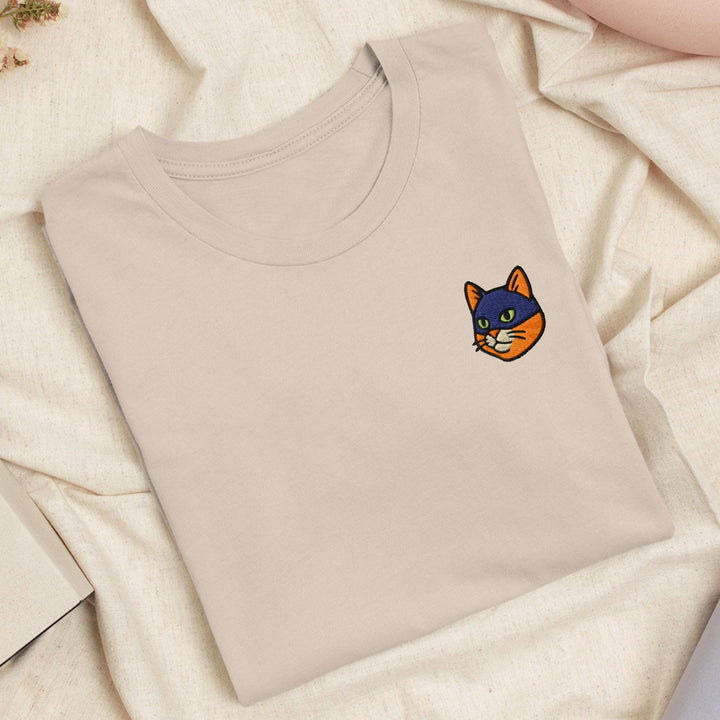 a t - shirt with a picture of a cat on it