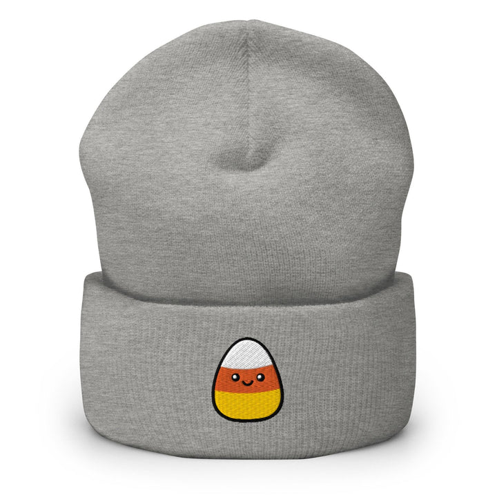 a grey beanie with an orange and white egg on it