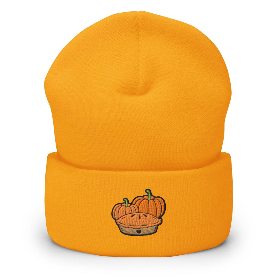 a yellow beanie with a picture of a pumpkin on it