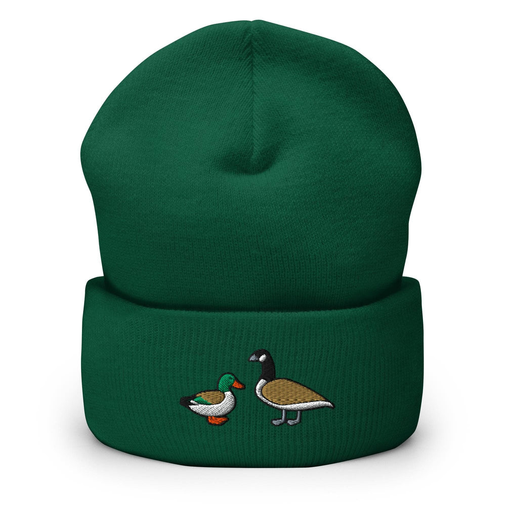 a green beanie with two ducks on it