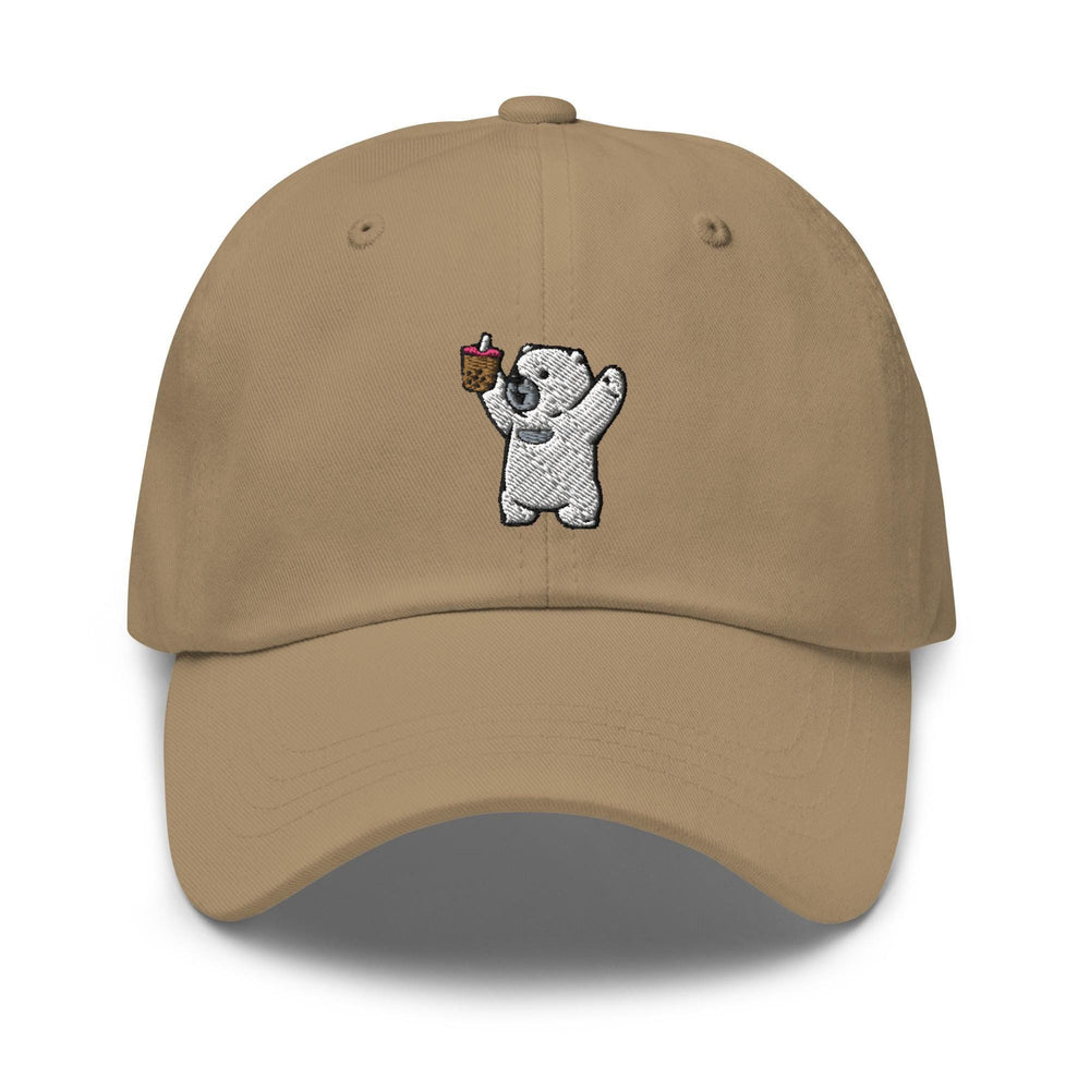 a baseball cap with a koala bear holding an apple