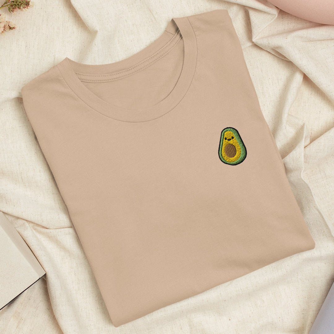 a t - shirt with an avocado embroidered on it