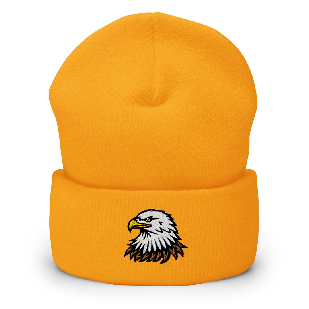 a yellow beanie with an eagle on it