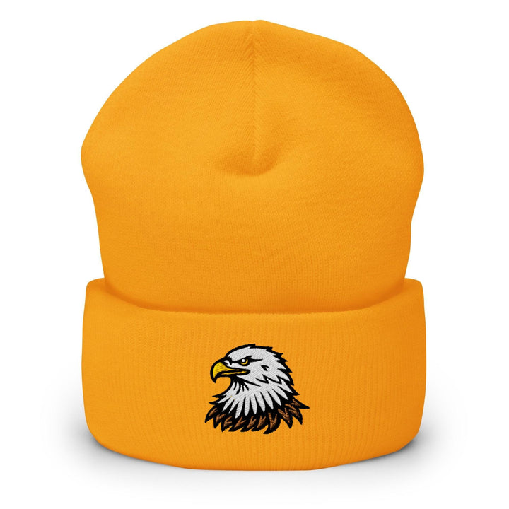 a yellow beanie with an eagle on it