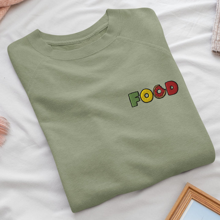 a green shirt with the word food on it