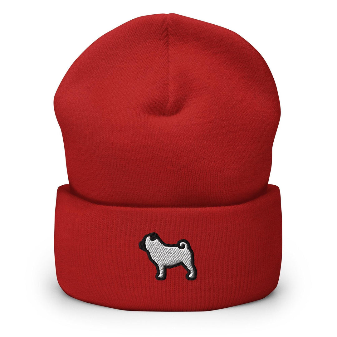a red hat with a black and white dog on it