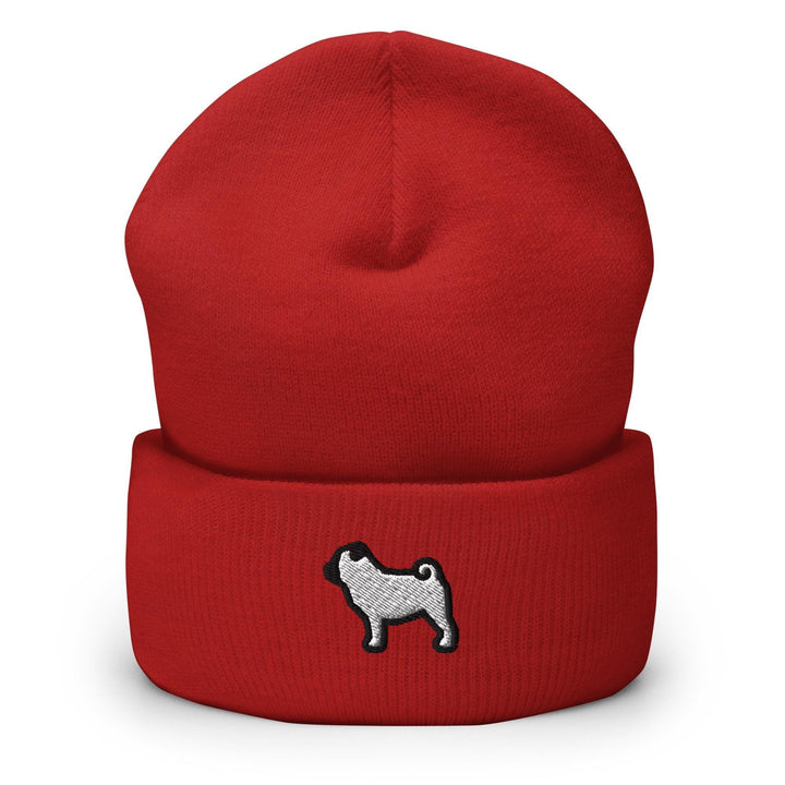 a red hat with a black and white dog on it
