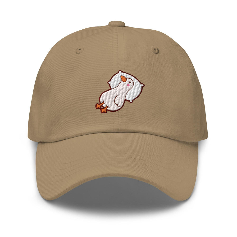 a tan baseball cap with a white polar bear on it