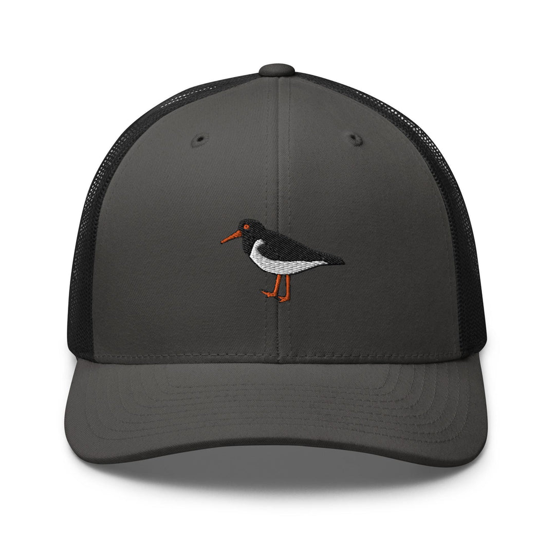 a gray and black hat with a bird embroidered on it