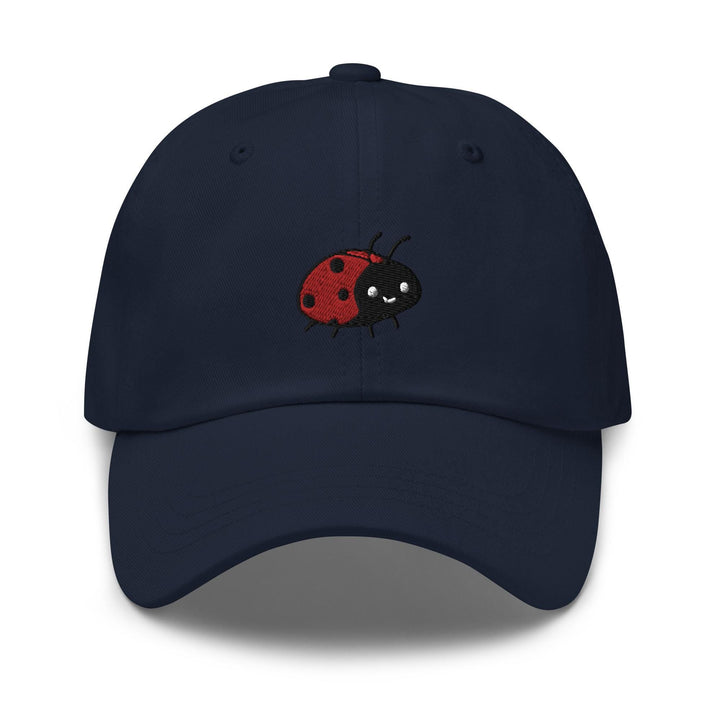 a blue hat with a ladybug embroidered on it