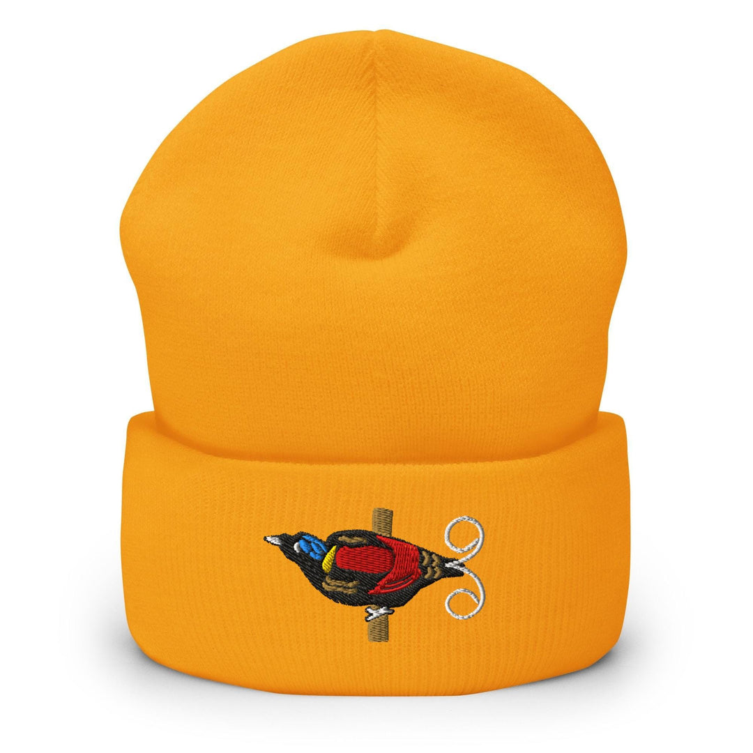 a yellow beanie with a bird on it