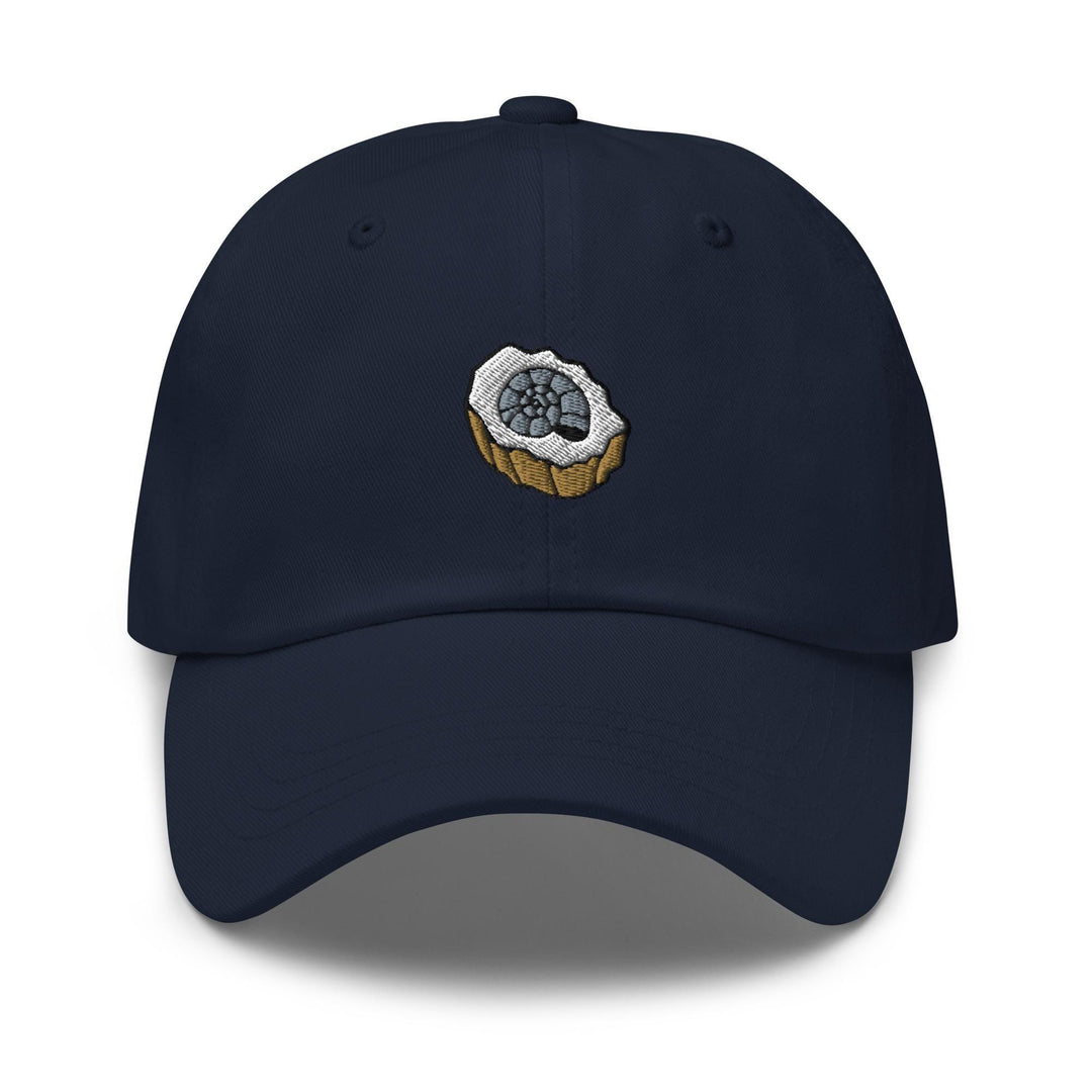 a blue hat with an image of a cupcake on it