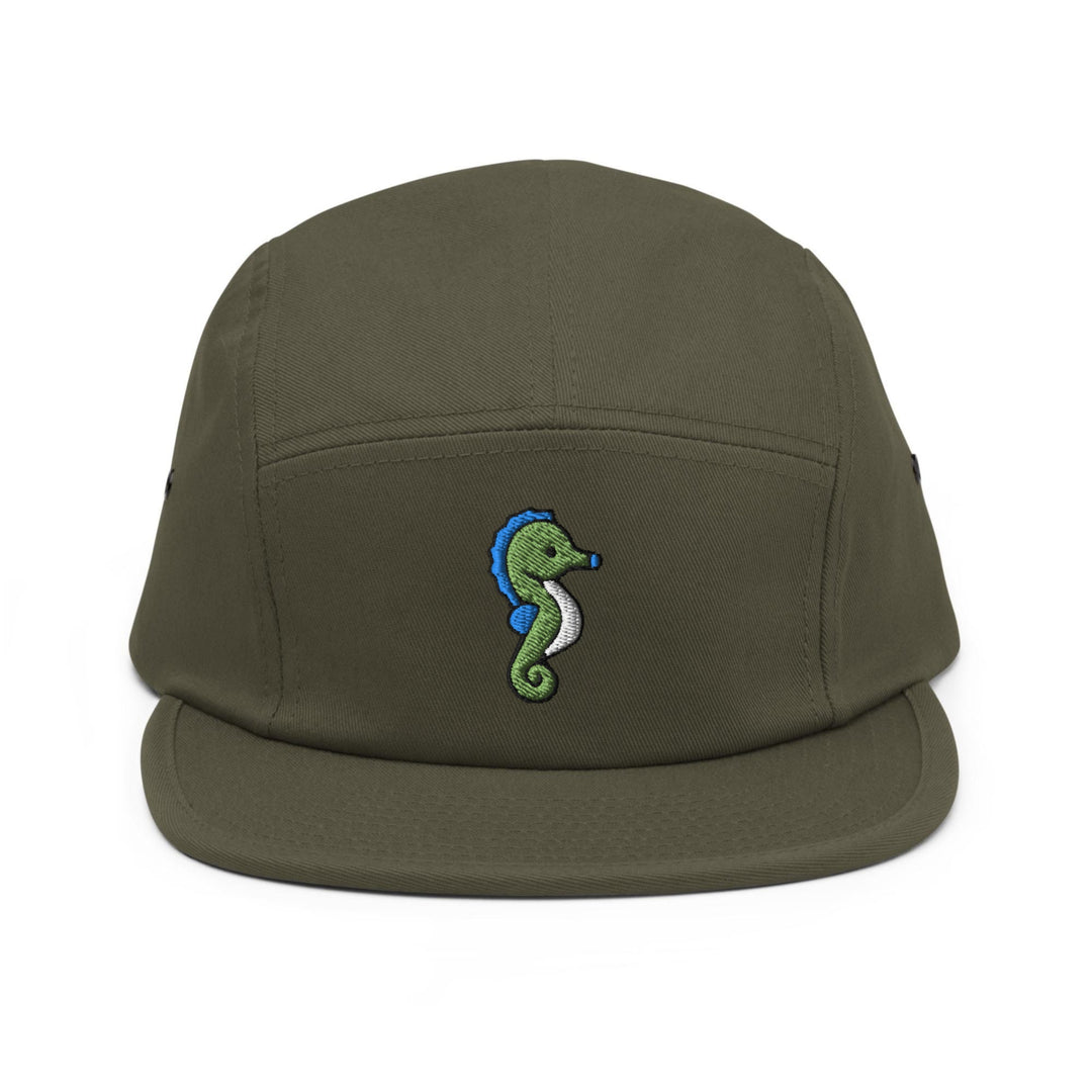 a green hat with a seahorse embroidered on it