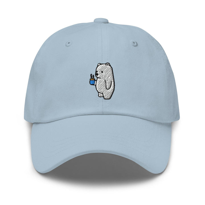 a light blue hat with a bear holding a cup