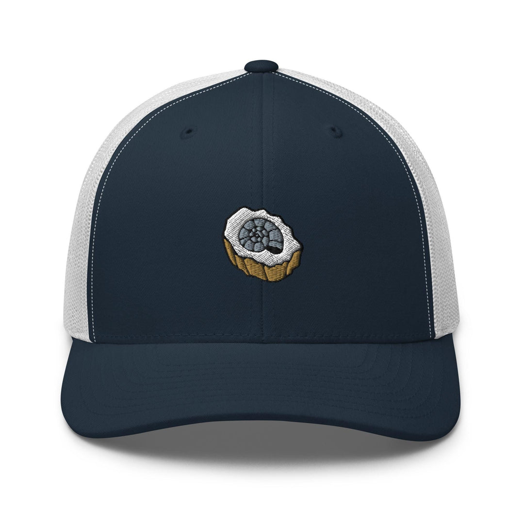 a blue and white trucker hat with an image of a muffin