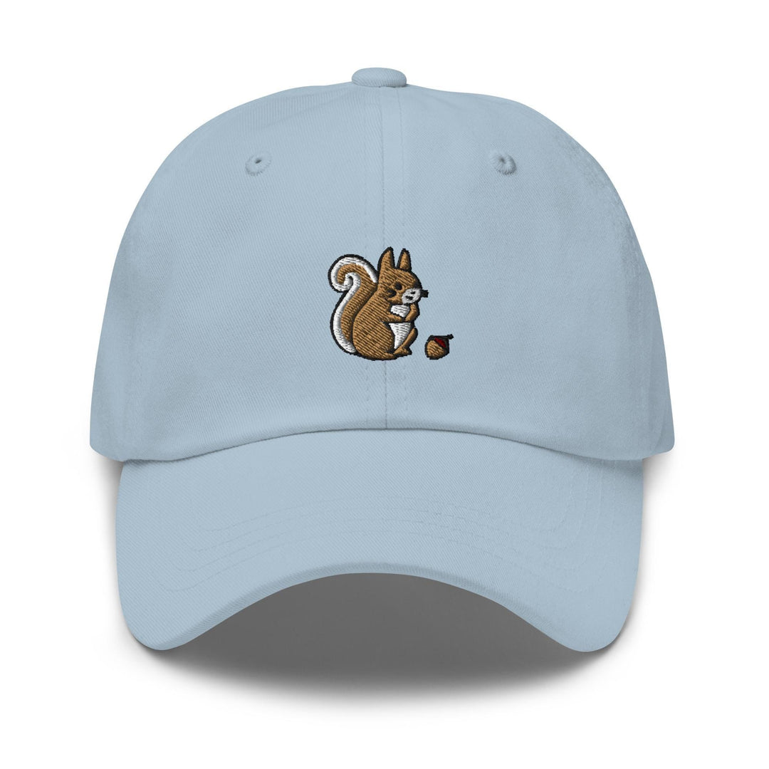 a light blue cap with a squirrel eating an acorn
