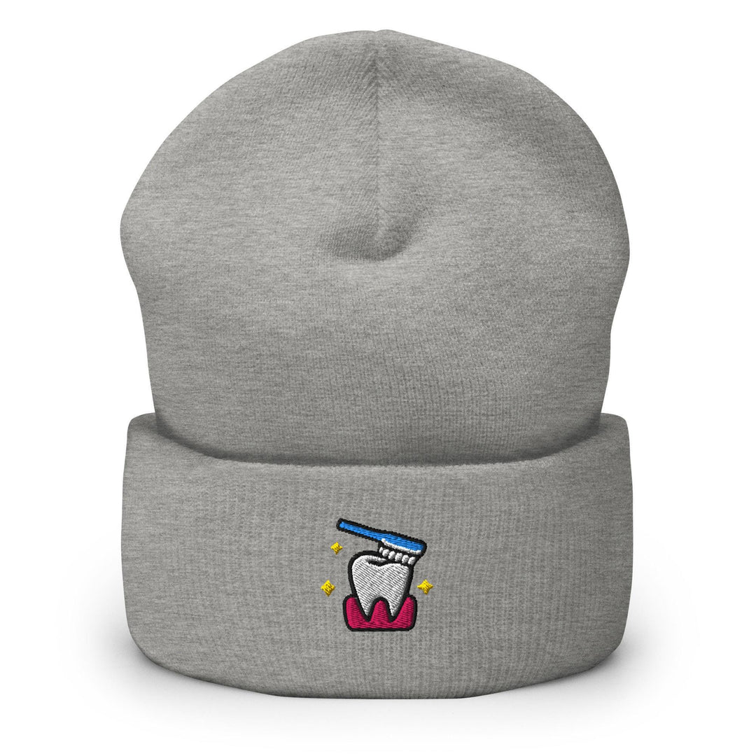 a grey beanie with a toothbrush on it