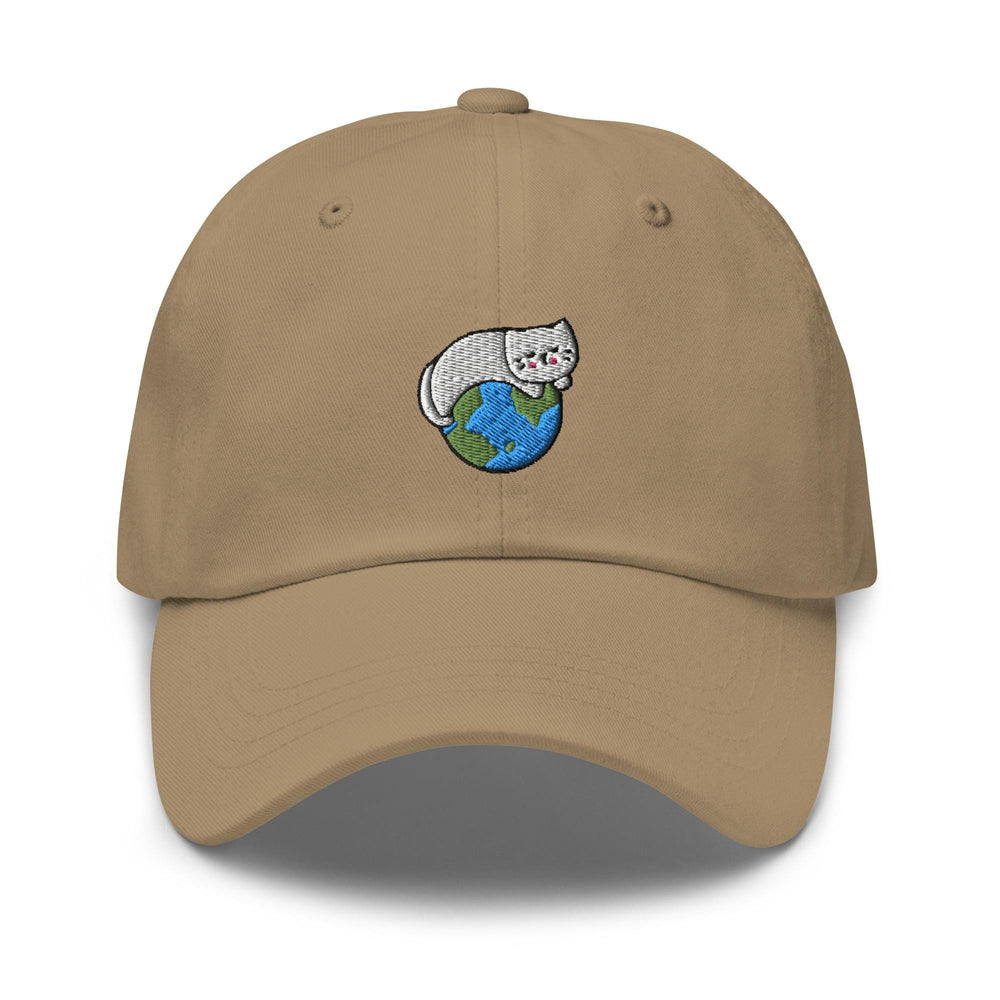 a tan hat with a cat on top of it
