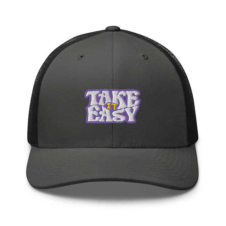 a gray trucker hat with the words take easy on it