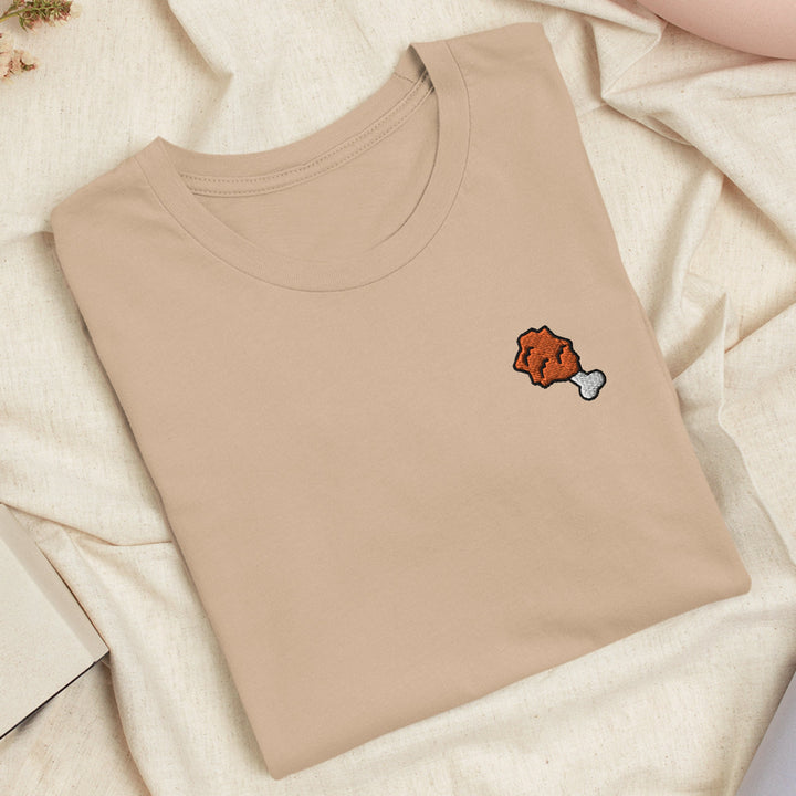 a t - shirt with a picture of a teddy bear on it