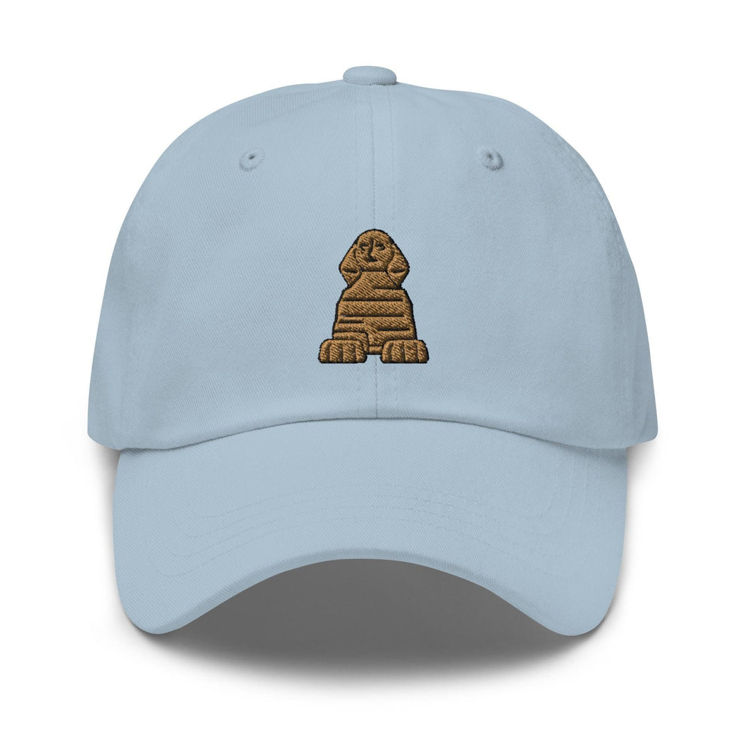 a light blue hat with a brown dog on it