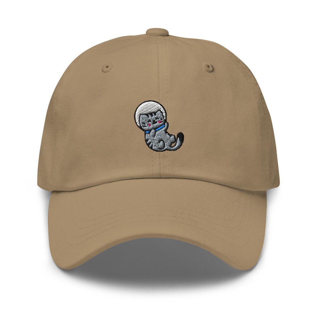 a tan hat with a cartoon cat on it