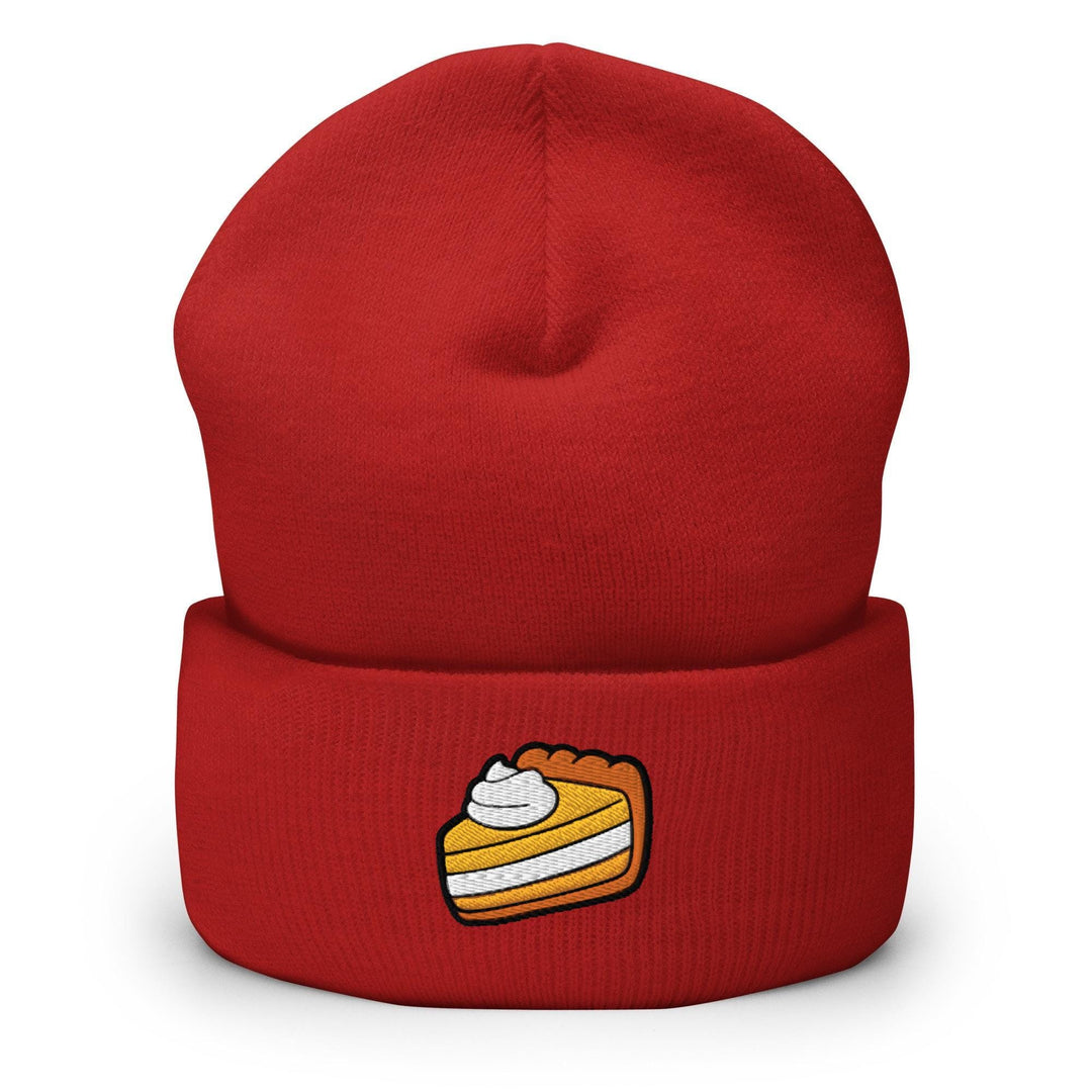 a red beanie with a piece of cake on it