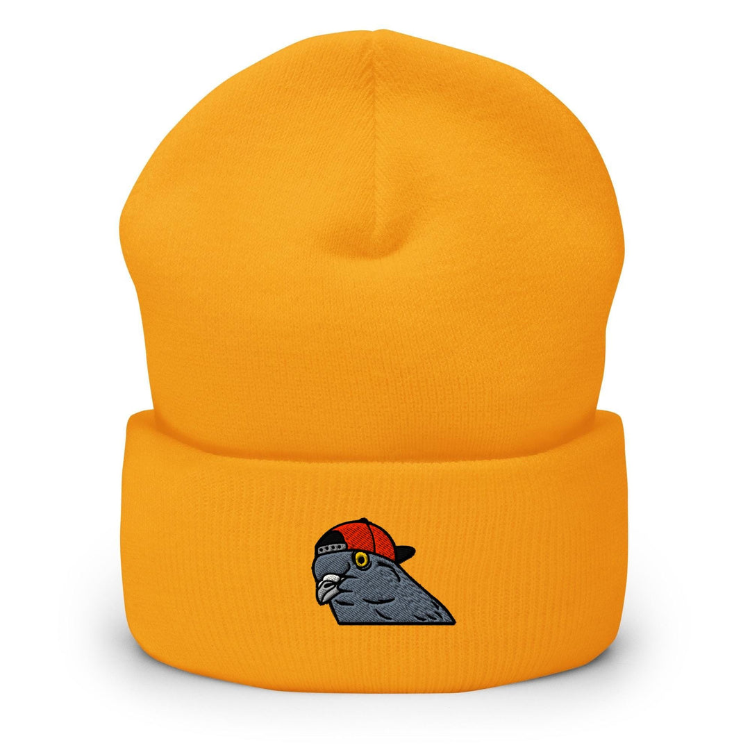 a yellow beanie with an image of a bird on it