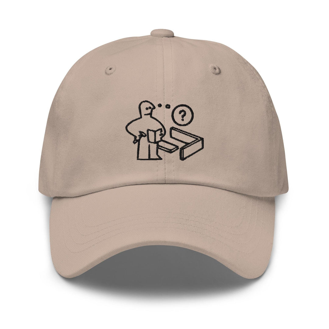 a baseball cap with a drawing of a man holding a box
