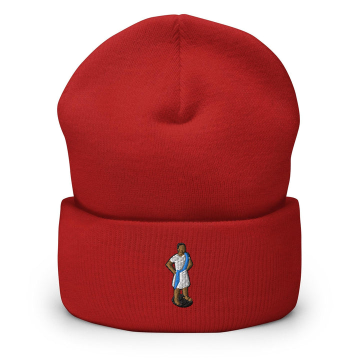 a red beanie with a picture of a person on it