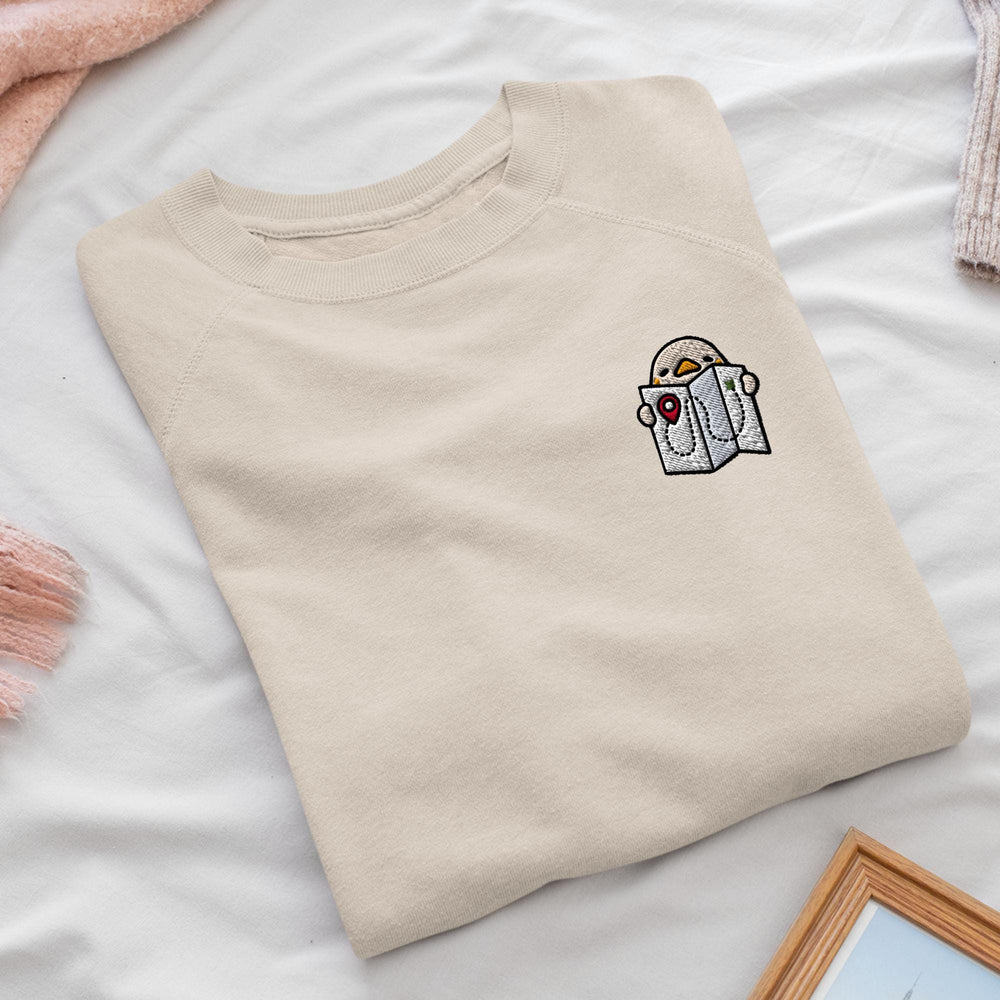 a t - shirt with a picture of a bird on it