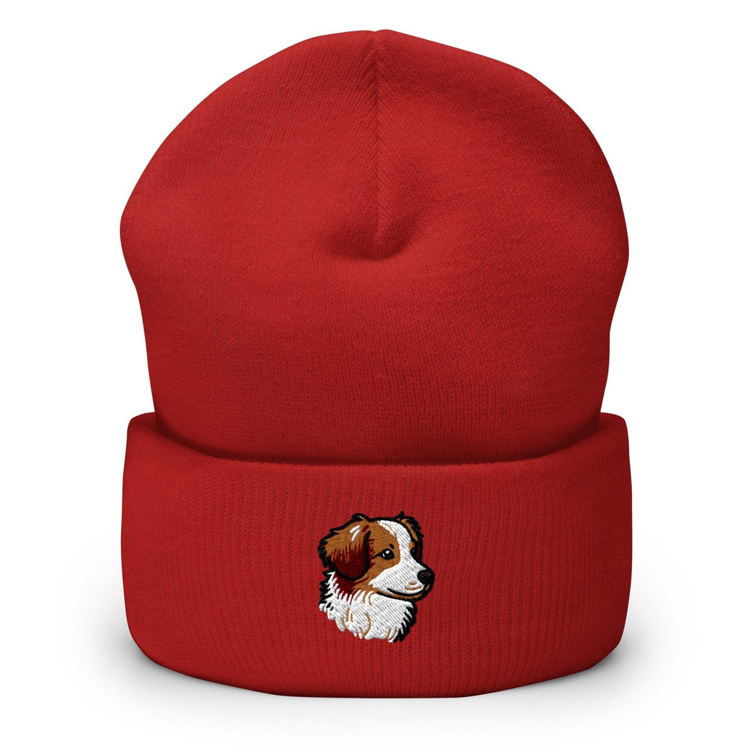 a red beanie with a picture of a dog on it